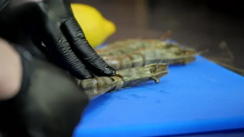 Preparing Shrimps for Cooking Stock Footage 131366725