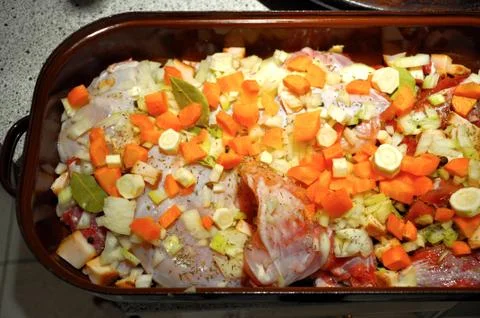Preparing sirloin from rabbit in pan Stock Photos