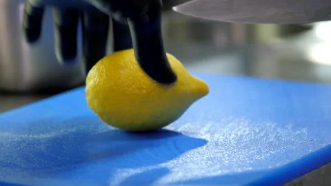 Preparing for a Slice of Lemon Stock Footage 131365628