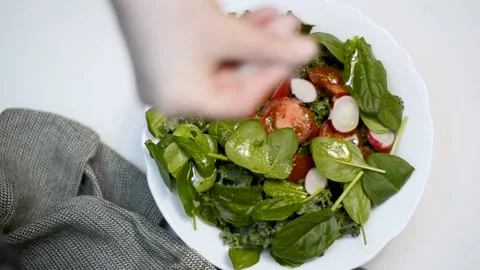 Preparing spinach and kale cabbage salad Stock Footage 170313376