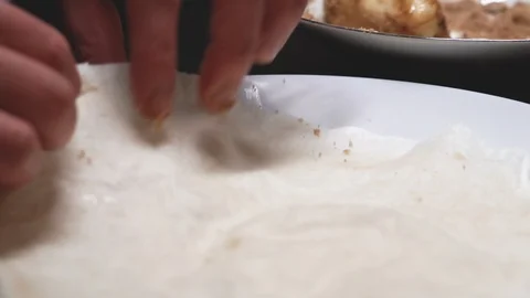 Preparing spring roll wrapper for cooking Stock Footage 109793044
