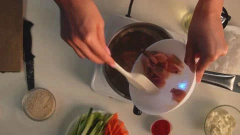 Preparing Spring Rolls in a Home Kitchen Setup Stock Footage 319786817