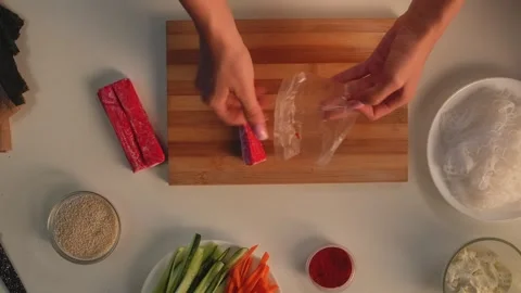 Preparing Spring Rolls in a Home Kitchen Setup Stock Footage 319787070