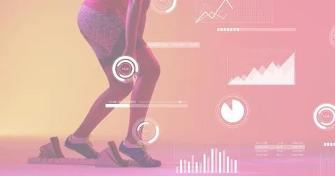 Preparing sprinter crouching in starting blocks at studio, in fitted top, Stock Photos