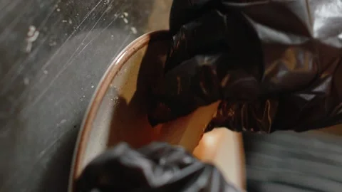 Preparing squid for dinner. Slow motion. 120 fps. Vertical video Stock Footage 172439986