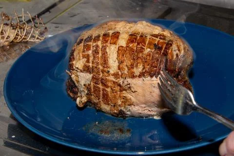 Preparing a stew with pork roll Stock Photos