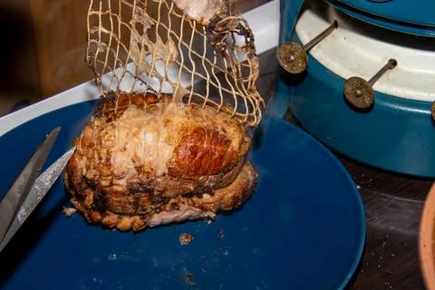 Preparing a stew with pork roll Stock Photos