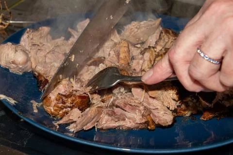 Preparing a stew with pork roll Stock Photos