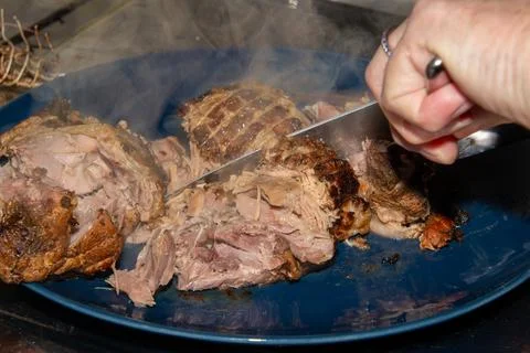 Preparing a stew with pork roll Foto stock