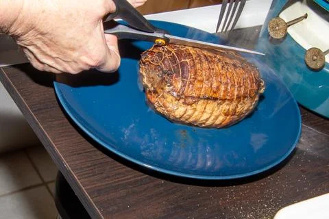 Preparing a stew with pork roll Stock Photos