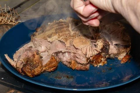 Preparing a stew with pork roll Stock Photos