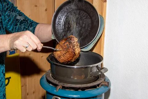 Preparing a stew with pork roll Stock Photos