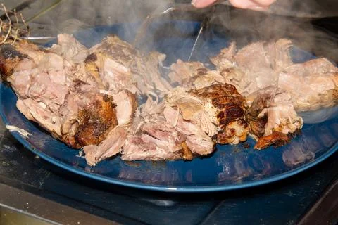 Preparing a stew with pork roll Stock Photos