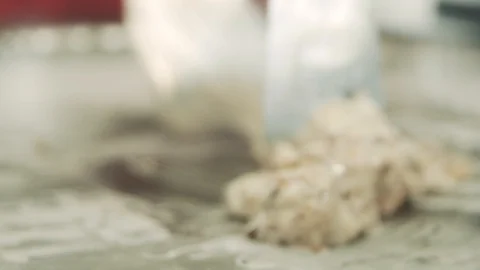 Preparing stir-fried ice cream rolls with chocolate bar at freeze pan. Rolled Stock-Footage 111264717