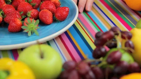 Preparing strawberries in colorful kitchen Stock Footage 42183019