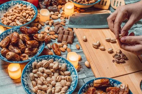 Preparing Stuffed dates in Kitchen Stock Photos