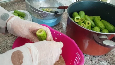 Preparing stuffed Zucchini (with rice and meat) at kitchen. Video stock 98761846