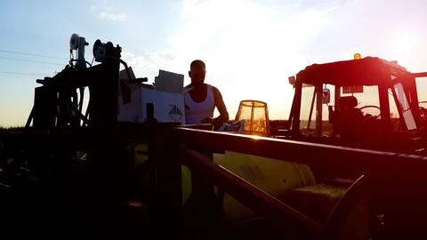 Preparing supplements of feeding cucumbers in the field. Stock Footage 72195479