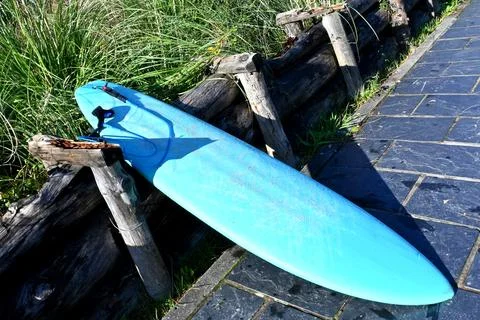 Preparing for surfing in the ocean Stock Photos