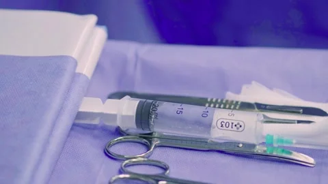 Preparing for surgery. Surgical instruments. Modern medical concept. Stock Footage 270461568