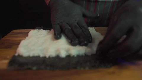 Preparing sushi on cutting board Stock Footage 280367371