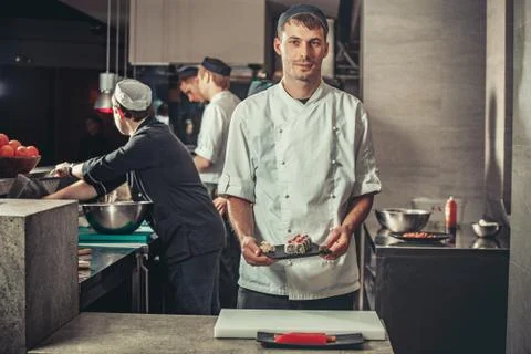 Preparing sushi set in restaurant kitchen Stock Photos