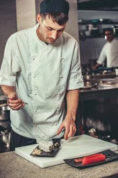 Preparing sushi set in restaurant kitchen Stock Photos