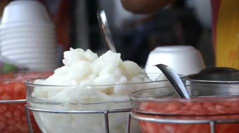 Preparing sweet coconut dessert Video stock 60219872