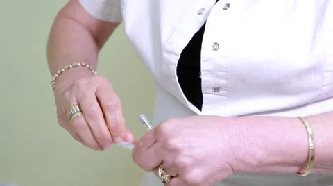 Preparing syringe before injecting silicone 스톡 동영상 63034603