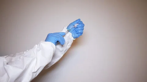 Preparing syringe for injection 3 of 5 Stock Footage 55378037