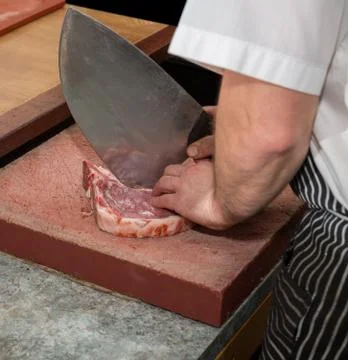 Preparing T-bone steak Foto stock