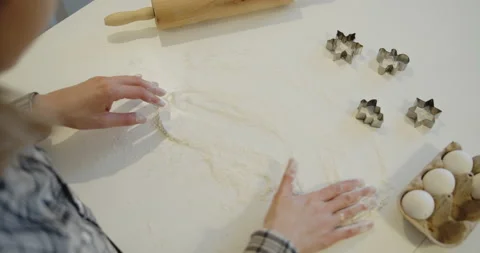 Preparing table for kneading dough for baking homemade cookies Stock Footage 146112079