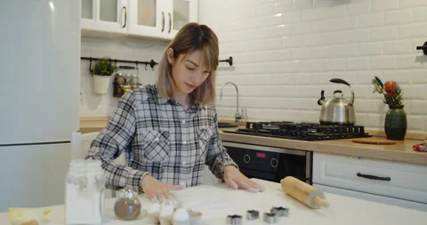Preparing table for kneading dough for baking homemade cookies Stock Footage 146112199