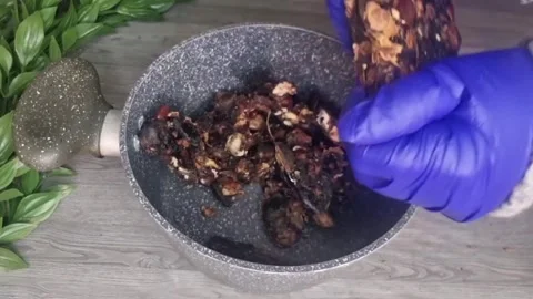 Preparing Tamarind Drink Soaking Tamarind in Hot Water - HD Stock Footage Stock Footage 343875942