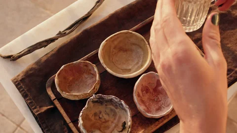 Preparing for tea ceremony, person puts utensils on wooden tray. tea master with Video stock 221953516