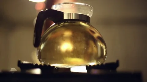 Preparing tea on a gas burner Stock Footage 73137522