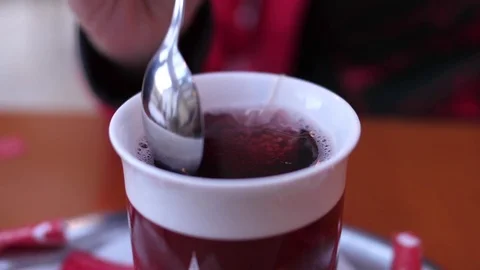 Preparing Tea, Stirring - Slow Motion Stock Footage 81190584