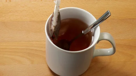 Preparing tea with tea bag Stock Footage 61195677