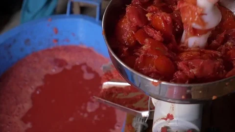 Preparing tomato juice - slow motion - focus on foreground Stock Footage 78182839