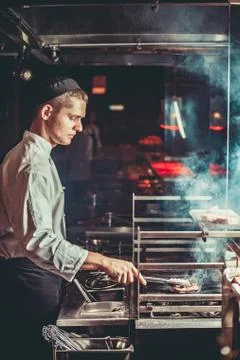 Preparing traditional beef steak Fotos Stock