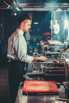 Preparing traditional beef steak Stock Photos