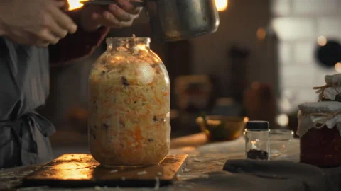 Preparing traditional cabbage fermentation with rossol marinade in a cozy ki 스톡 동영상 331357407