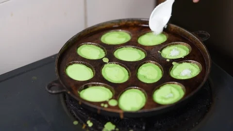 Preparing a traditional delicacies cake called KUIH CARA MANIS. Stock Footage 90419501