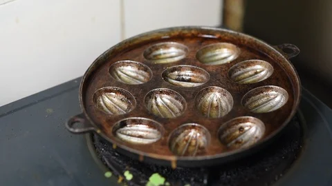 Preparing a traditional delicacies cake called KUIH CARA MANIS. Stock Footage 90419695