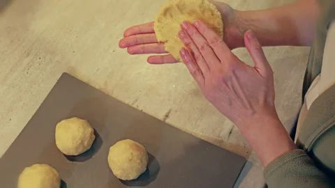Preparing traditional Polish Meat-filled Potato Dumplings With Homemade Dough Stockbeeldmateriaal 294993858