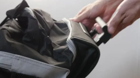 Preparing travel bag  and going on vacation close-up 4K 2160p 30fps UltraHD Stock Footage 67859489