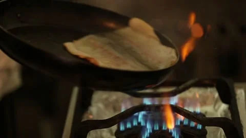 Preparing trout in a cooking pan Stock Footage 132054738