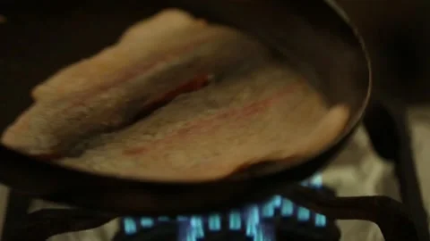 Preparing trout in a cooking pan Stock Footage 132054763