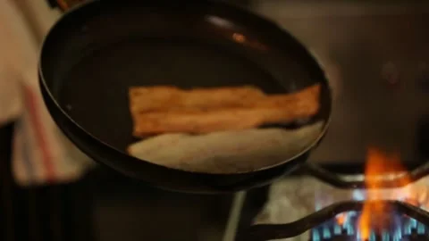 Preparing trout in a cooking pan Stock Footage 132054891