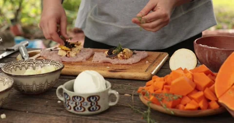 Preparing turkey rolls stuffed with cheese and thyme for thanksgiving day Stock Footage 165121516